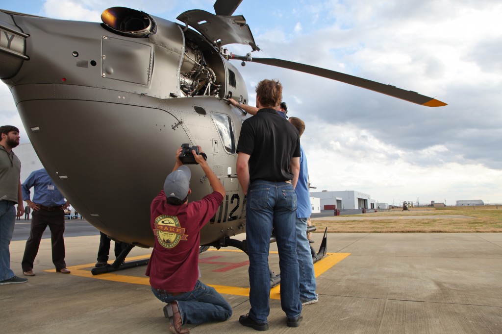 Andrew LeClair views the helicopter engine through the FLIR infrared camera.