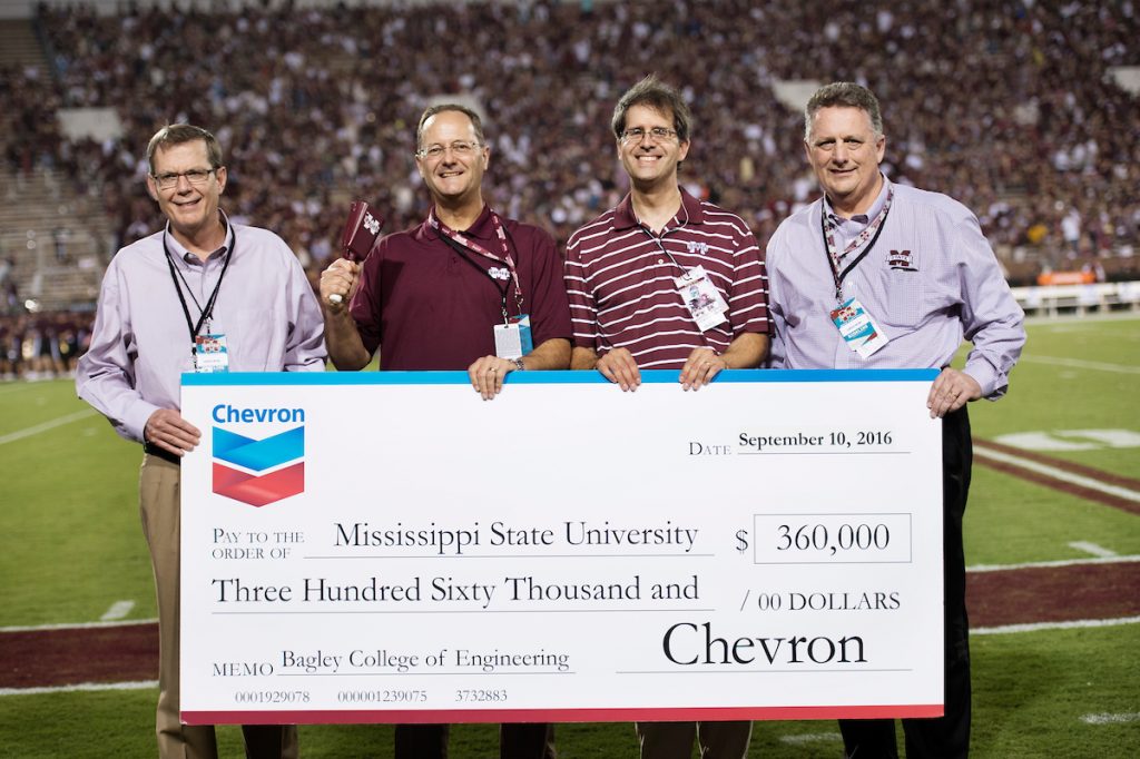 Chevron presents check to the Bagley College of Engineering during MSU Football versus South Carolina game in Davis Wade Stadium. (photo by Megan Bean / © Mississippi State University)
