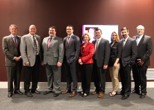 From L-R: Paul Lichlyter, Terry M. Abel, Michael Wade Shrader, Robert Andrew Martin, Theresa Graves Maxwell, David John Machado, Leslie Henderson, Mark E. Henderson, Kirt J. Cuevas; (not pictured: Donald Wendland) 