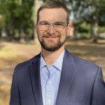 Head shot of associate dean of research and engagement, Adam Smith